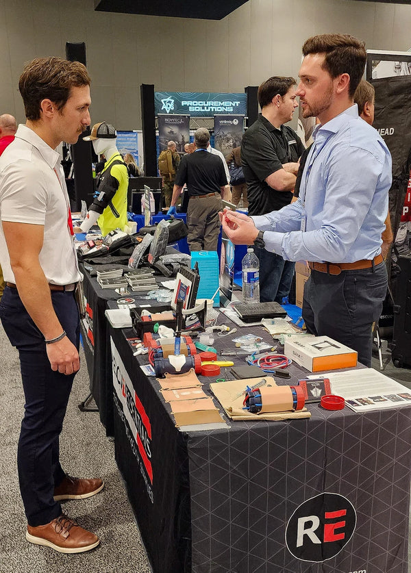 Wesley Mourton demonstrating the MITS at the 2023 Special Operations Medical Association Conference